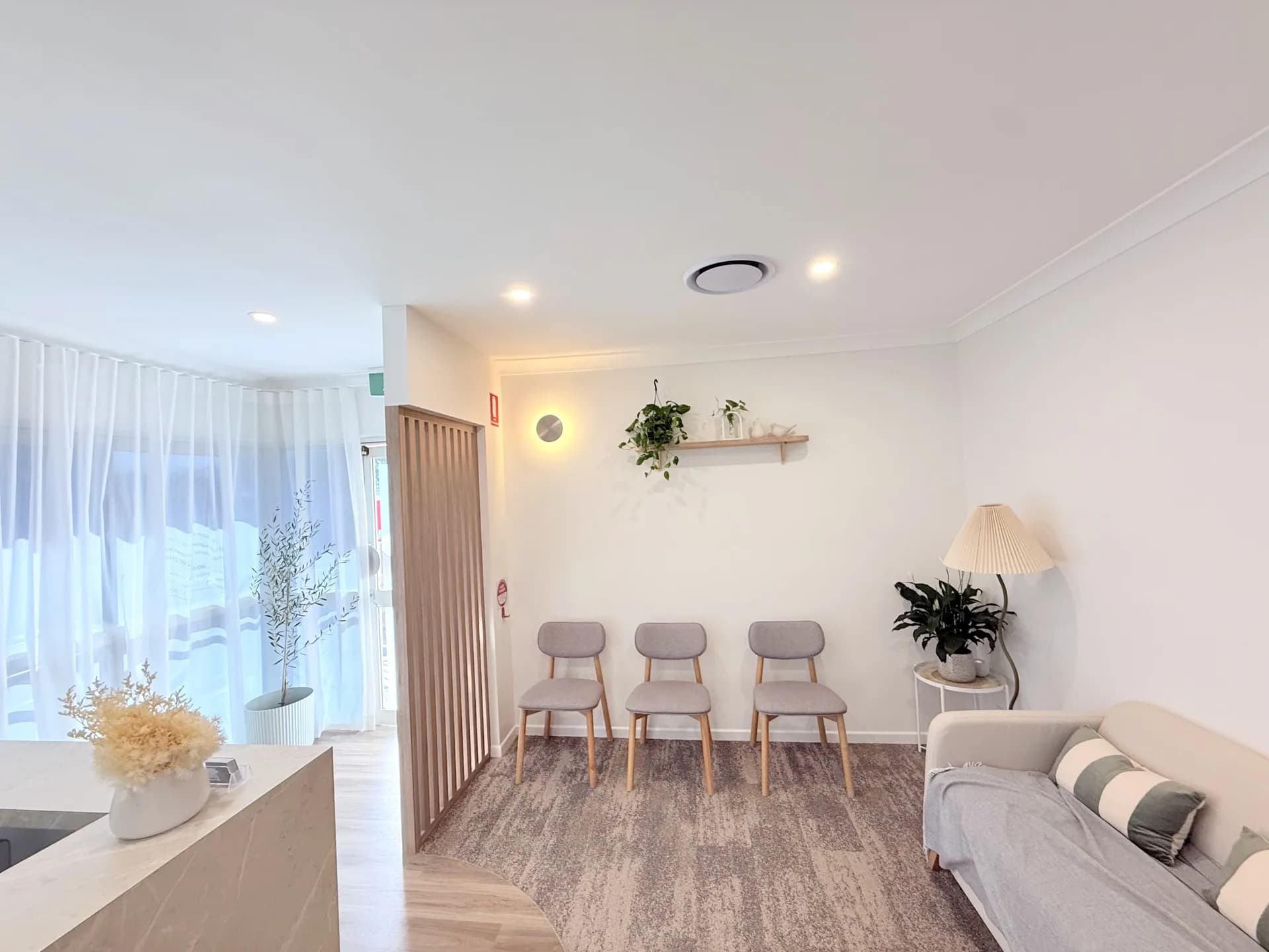 LightUP Dental waiting area — warm, modern reception space